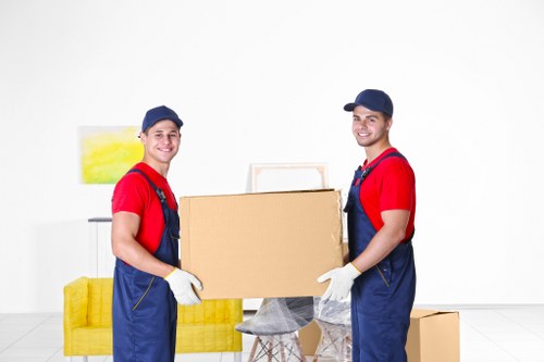 Team unloading belongings during a Bow house or flat move