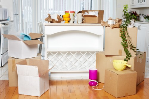 Moving checklist and prepared boxes for a home move in Bow