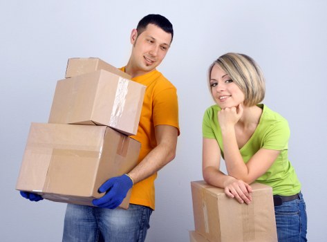 Van loading furniture and boxes for a local move in Bow