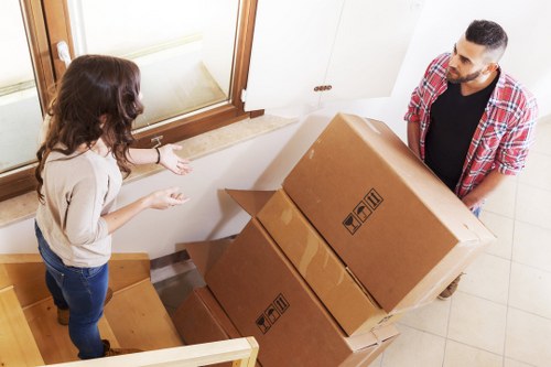Local removals team loading household items in Bow