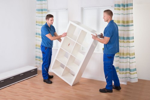 Office furniture and equipment being prepared for a move